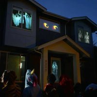 Magical Outdoor Decor: Halloween & Christmas Window Projector featuring 12 Movies - craftmasterslate